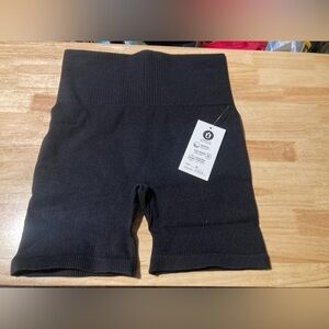 4/$25 WT OTOS black shorts in size Medium. Brand new. Stretches & wicks sweat